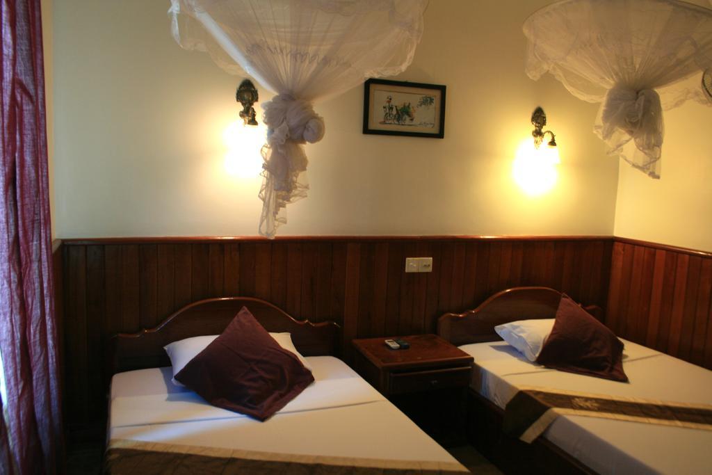 Firefly Guesthouse - The Berlin Angkor Siem Reap Phòng bức ảnh