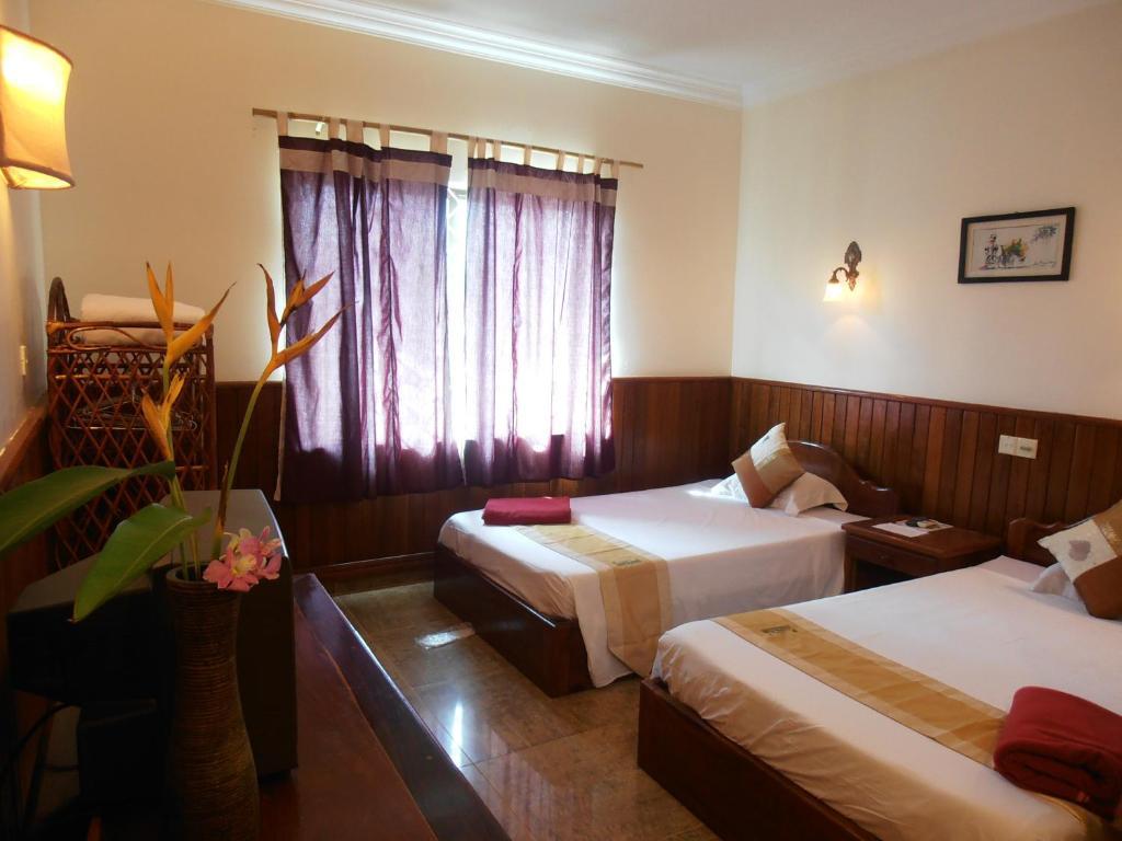 Firefly Guesthouse - The Berlin Angkor Siem Reap Phòng bức ảnh