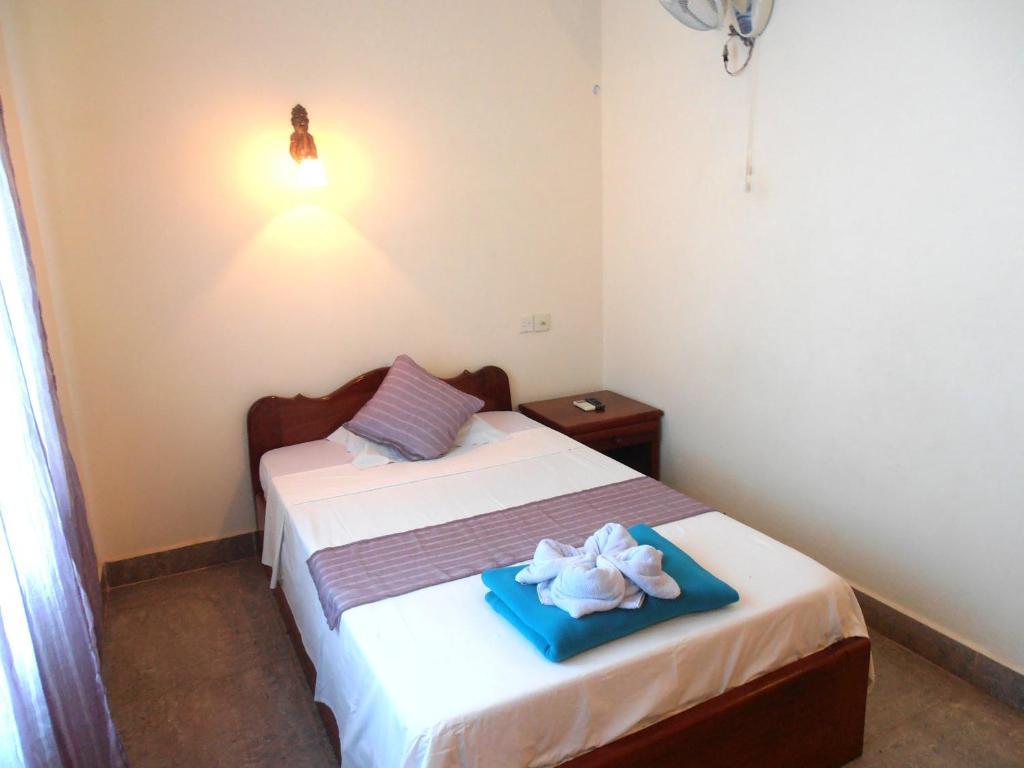 Firefly Guesthouse - The Berlin Angkor Siem Reap Phòng bức ảnh